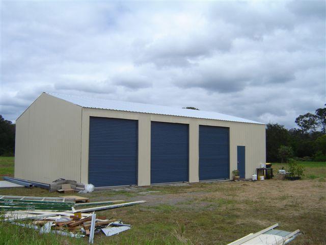 Ezy Blox Sheds Triple Garage- 11.4m(L) x 10.2m(W) ; 3 Roller Doors Inc.