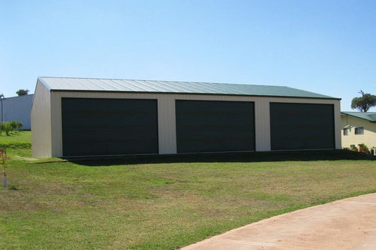 Ezy Blox Sheds Triple Garage- 11.8m(L) x 9.8m(W) ; 3 Roller Doors Inc.